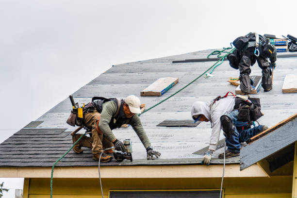 Professional Roofing technician working in Salem, MA